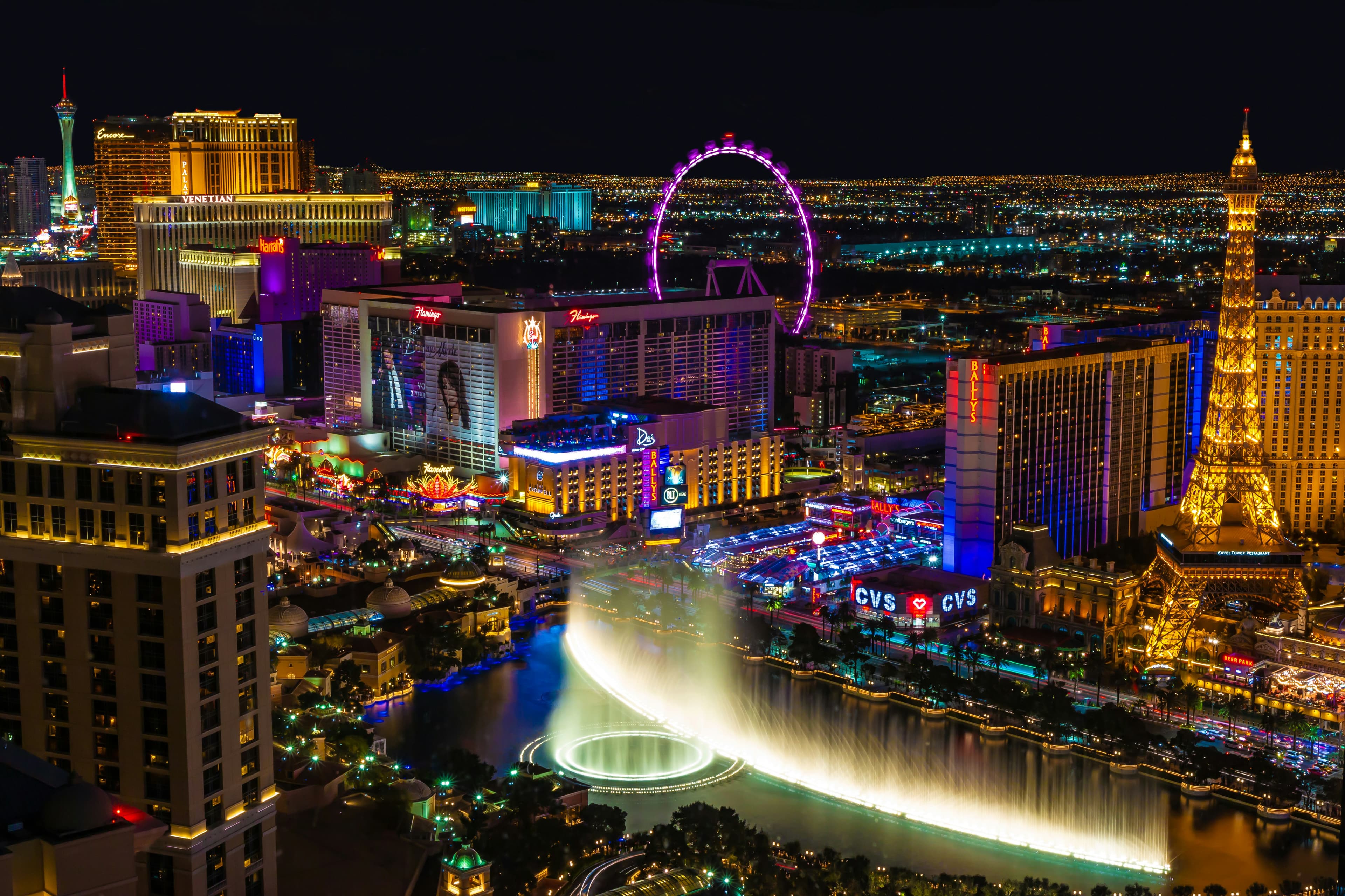 Aerial view of the Las Vegas Strip at night with the Bellagio fountains